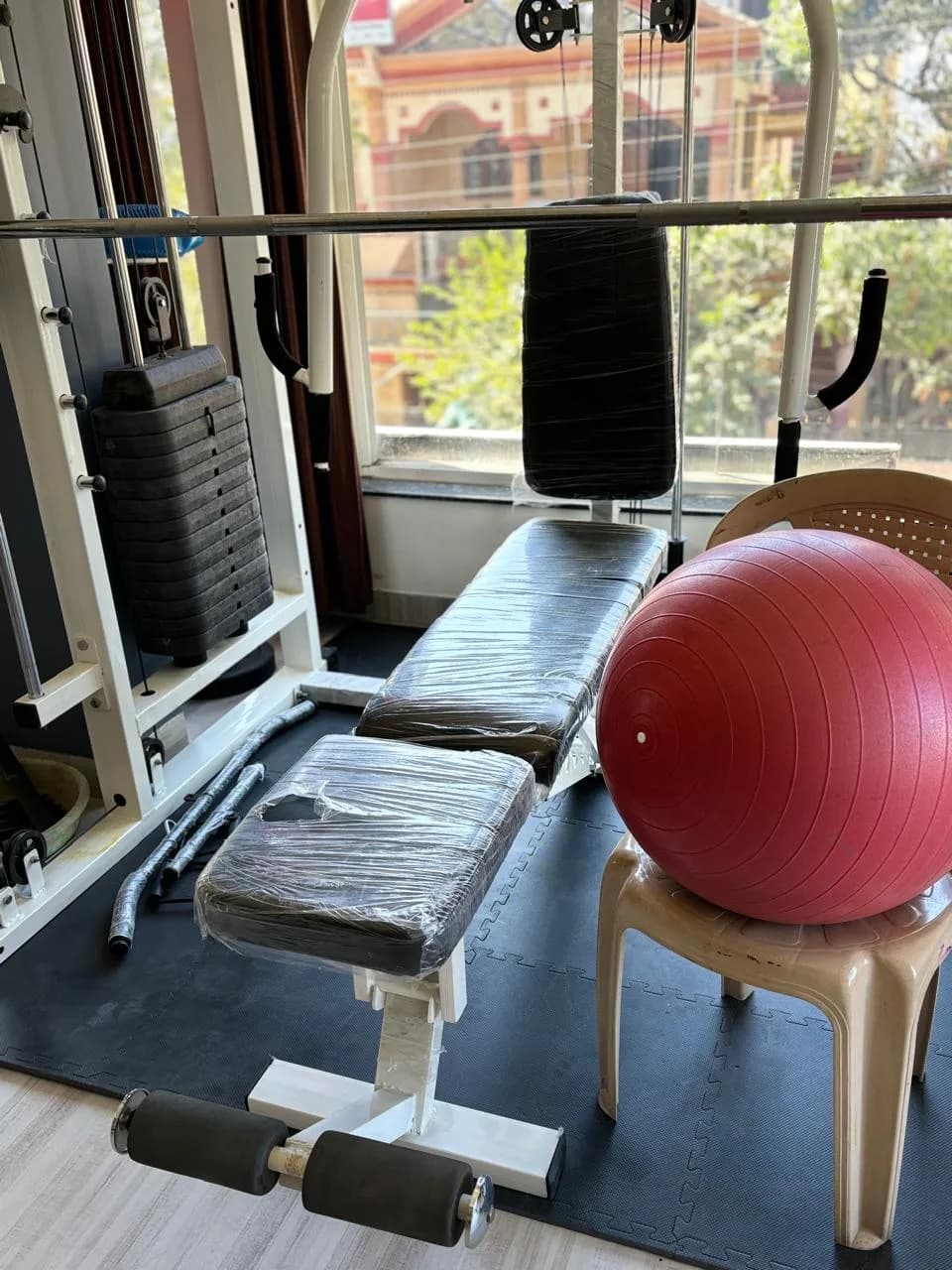Multi-gym station, bench and exercise ball in the Fitness Hub