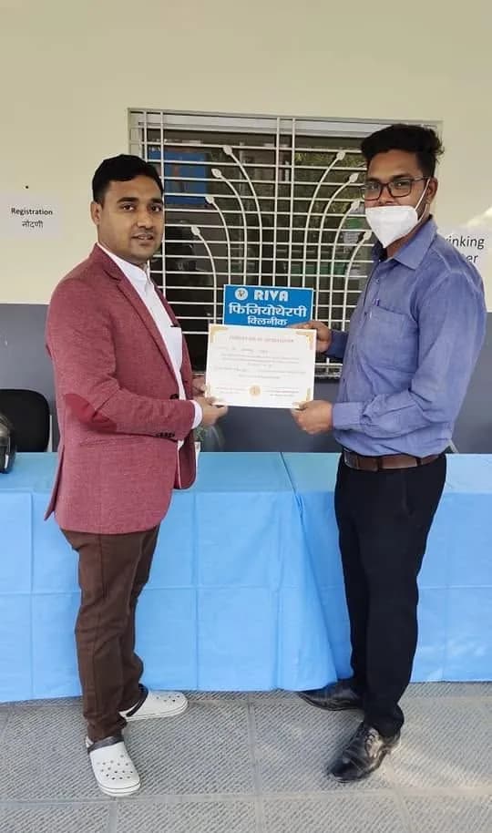 Certificate of appreciation presented at a Riva Clinic health camp